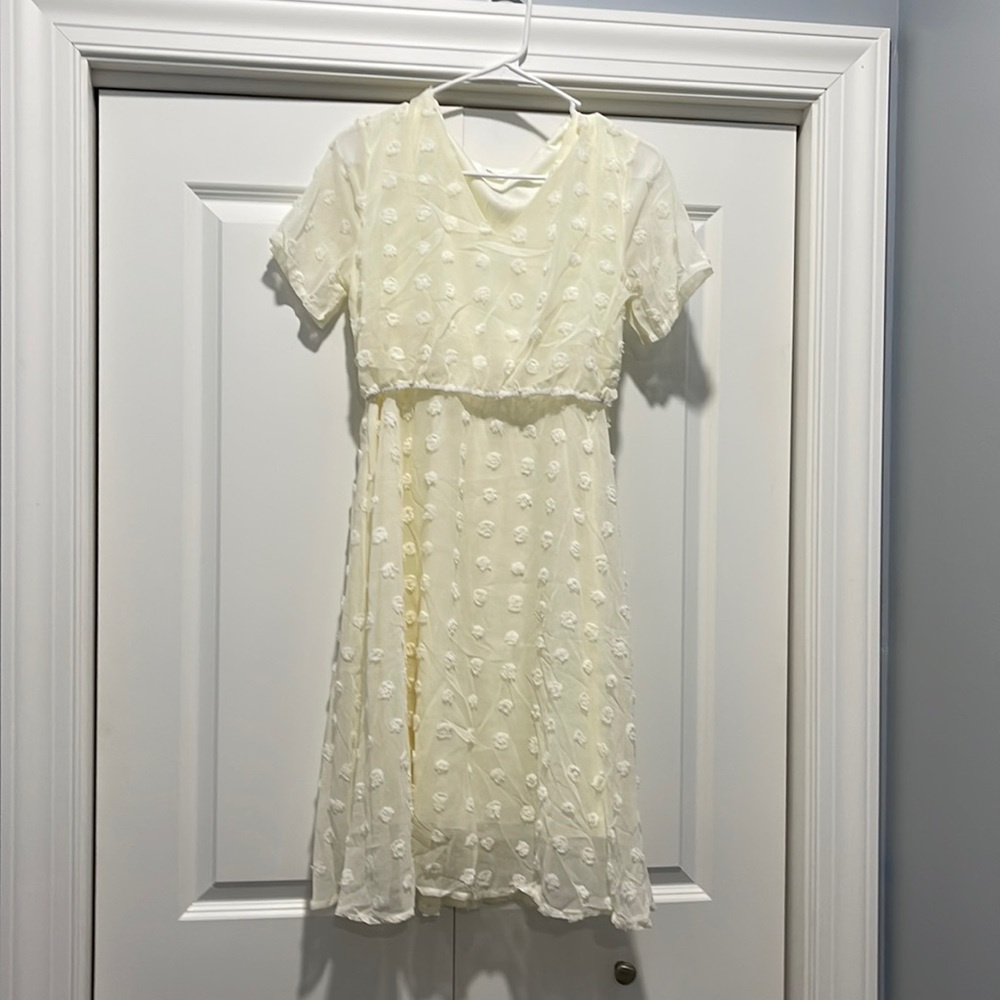 Women’s knee length, short sleeve, dress size XL. IN GREAT CONDITION!